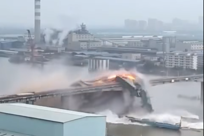 Tanker Caught Under a Crumbling Bridge
